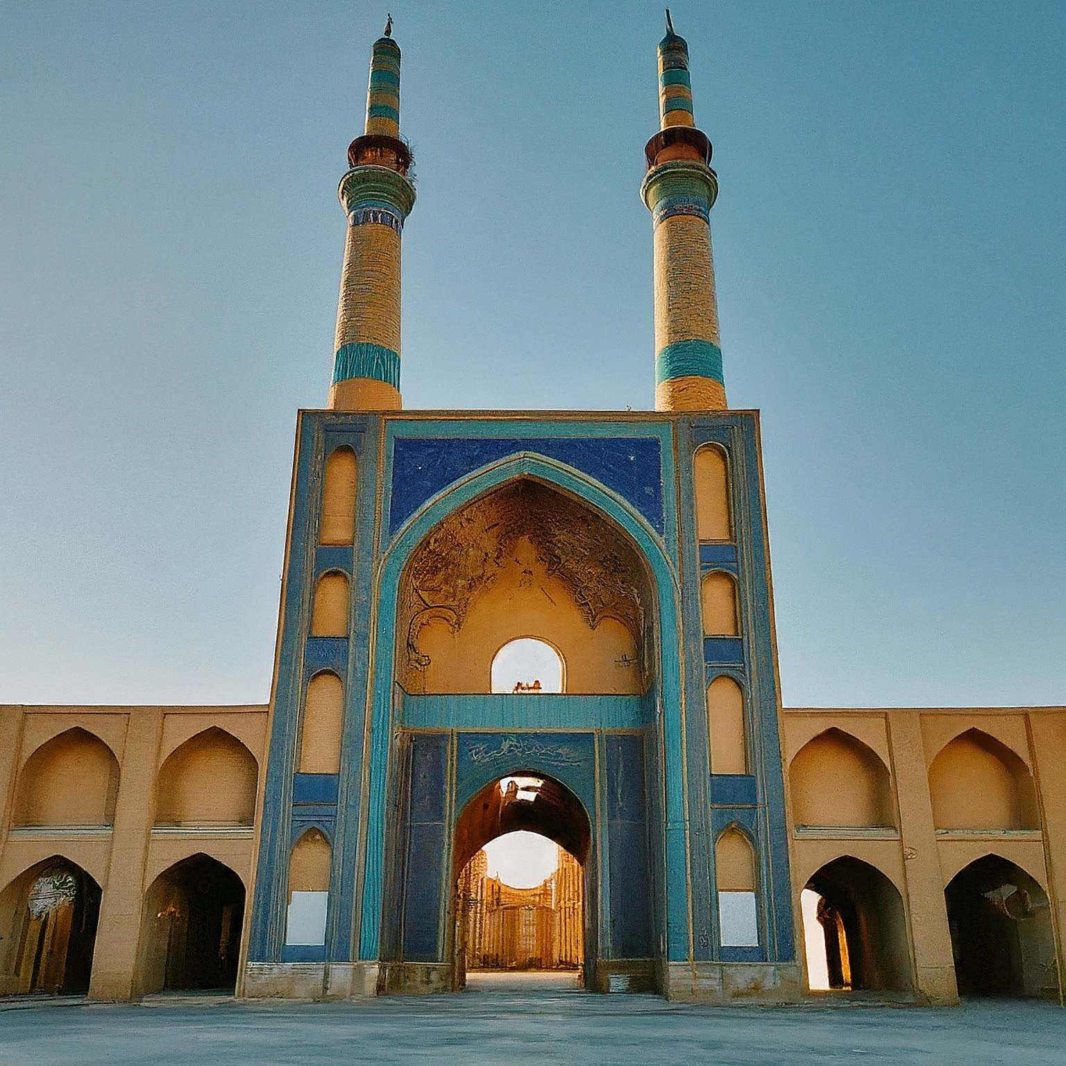 Friday Mosque in Yazd, Iran, with towering minarets and geometric façade patterns.