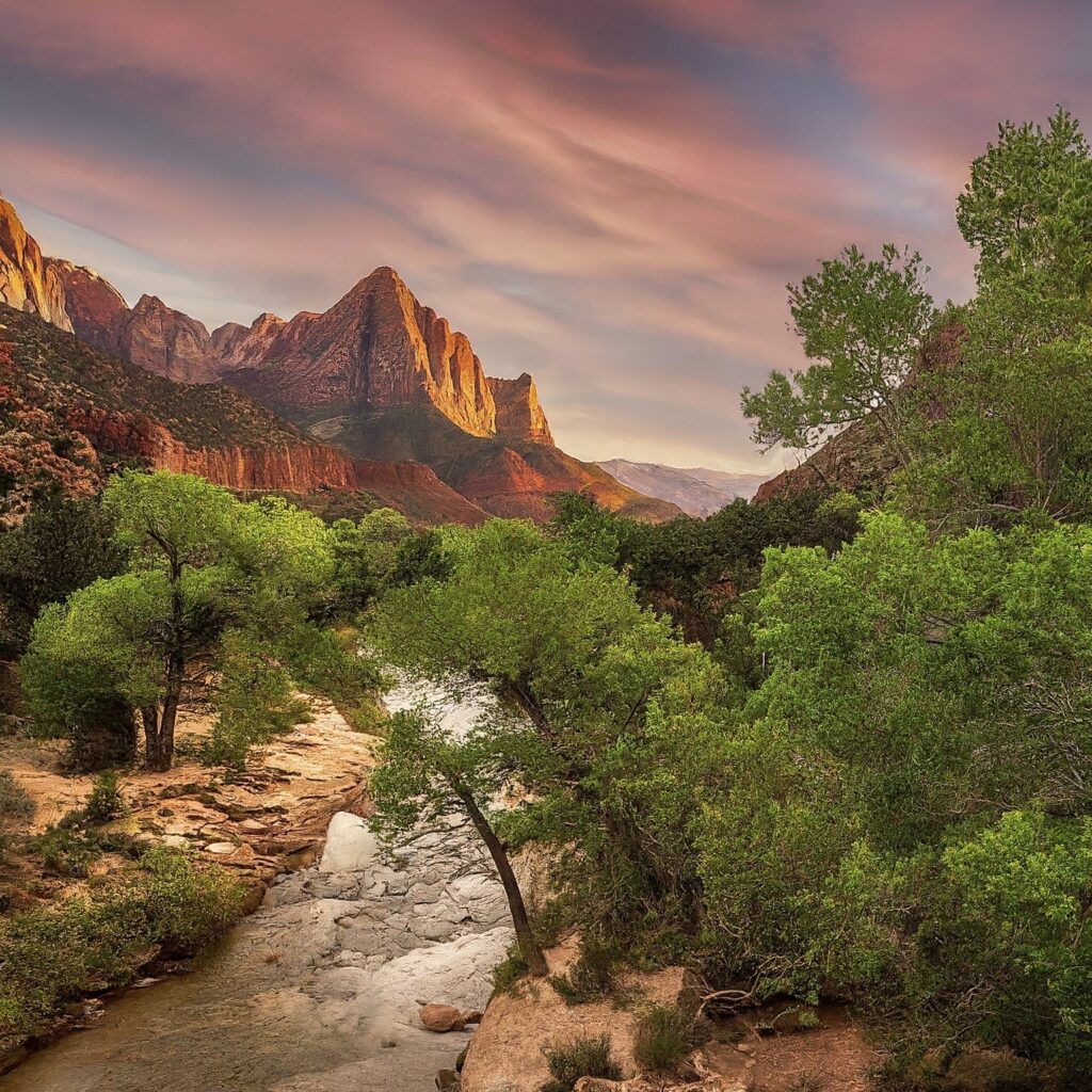 Zion National Park, USA, with red cliffs and a sunset.