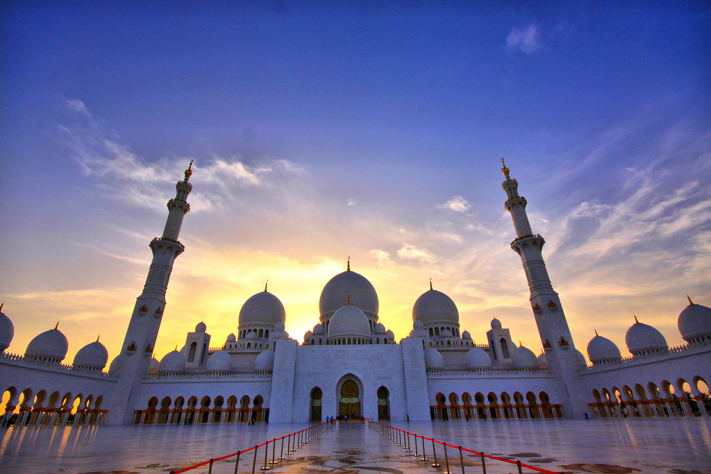 Sheikh Zayed Grand Mosque complex, Abu Dhabi, UAE, panoramic view with gardens and pools.